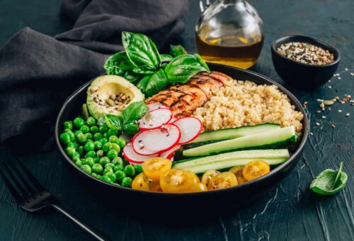 Healthy salad bowl with quinoa and chicken